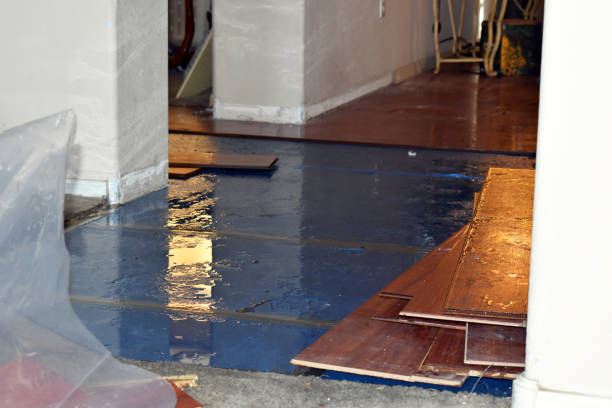 Professional Flood Damage Restoration technician working in Summit, UT